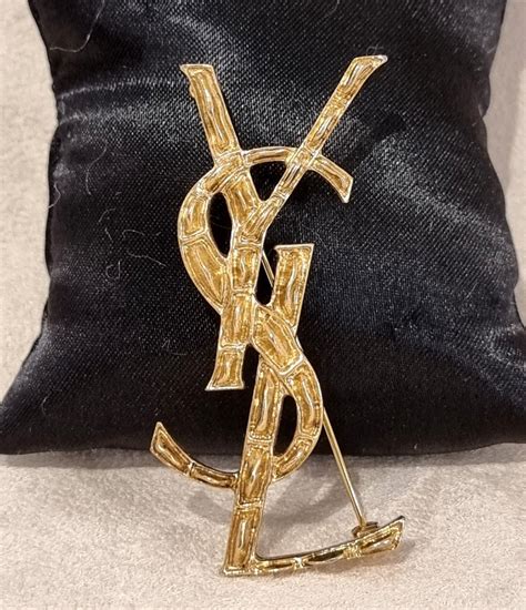 ysl brooch price|More.